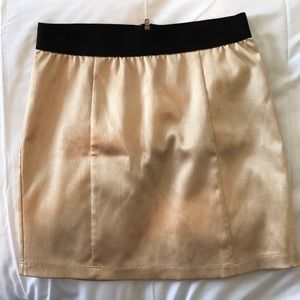 Gold mini skirt
